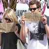Photos: Emma Stone And Andrew Garfield Thwart Paparazzi With Charity Plugs